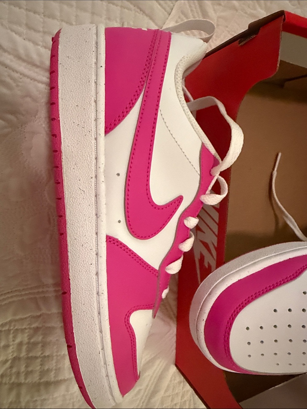 Nike Women's Low-Top Sneaker in White and Hot Pink